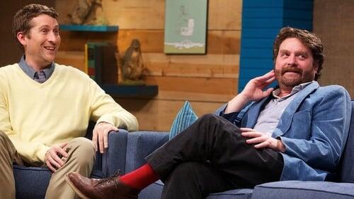 Zach Galifianakis Wears a Blue Jacket & Red Socks